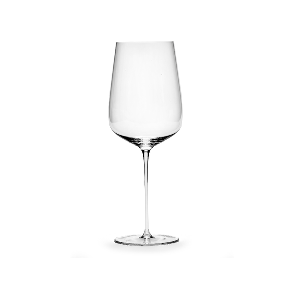 A glass of Unity by Tomorrowland red wine