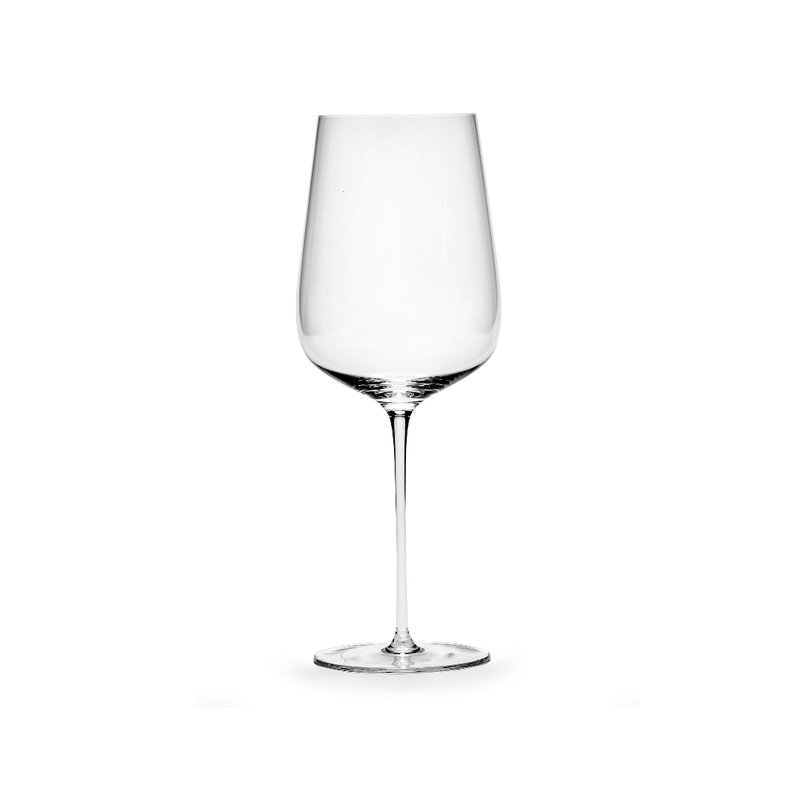 A glass of Unity by Tomorrowland red wine