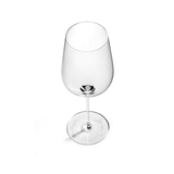 A glass of Unity by Tomorrowland red wine