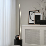 Bow floor lamp