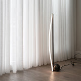 Bow floor lamp