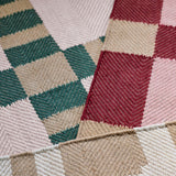 Evelina Kroon plum punch jute rug
